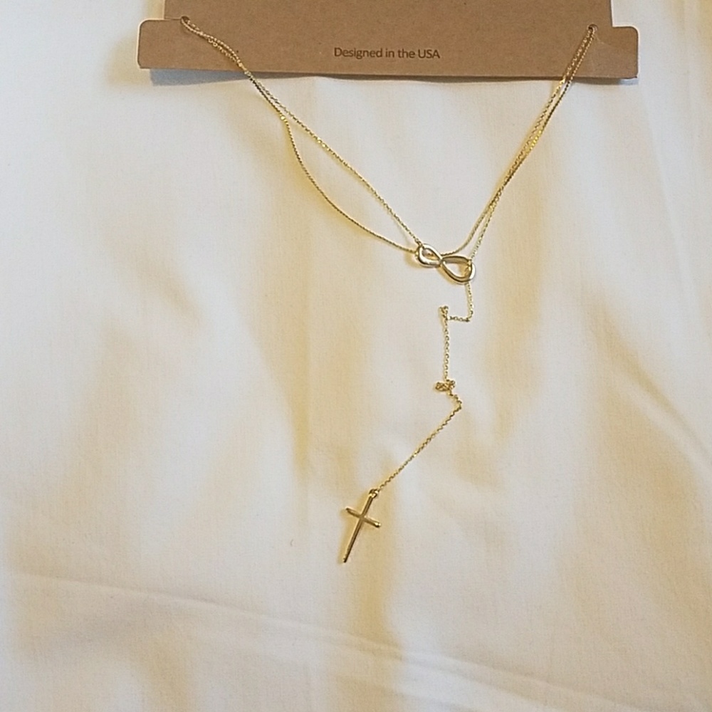 Gold infinity necklace.